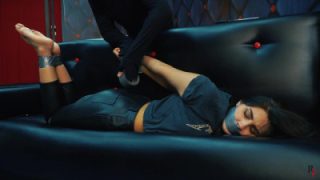 Ada’s capture in leather clothes – Silver tape bondage and tickling